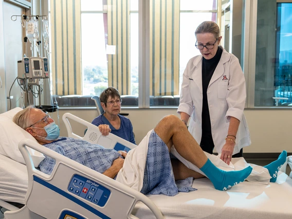 Doctor with patient in clinic.