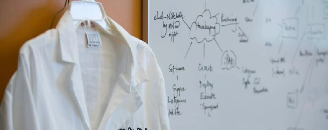 lab coat and whiteboard